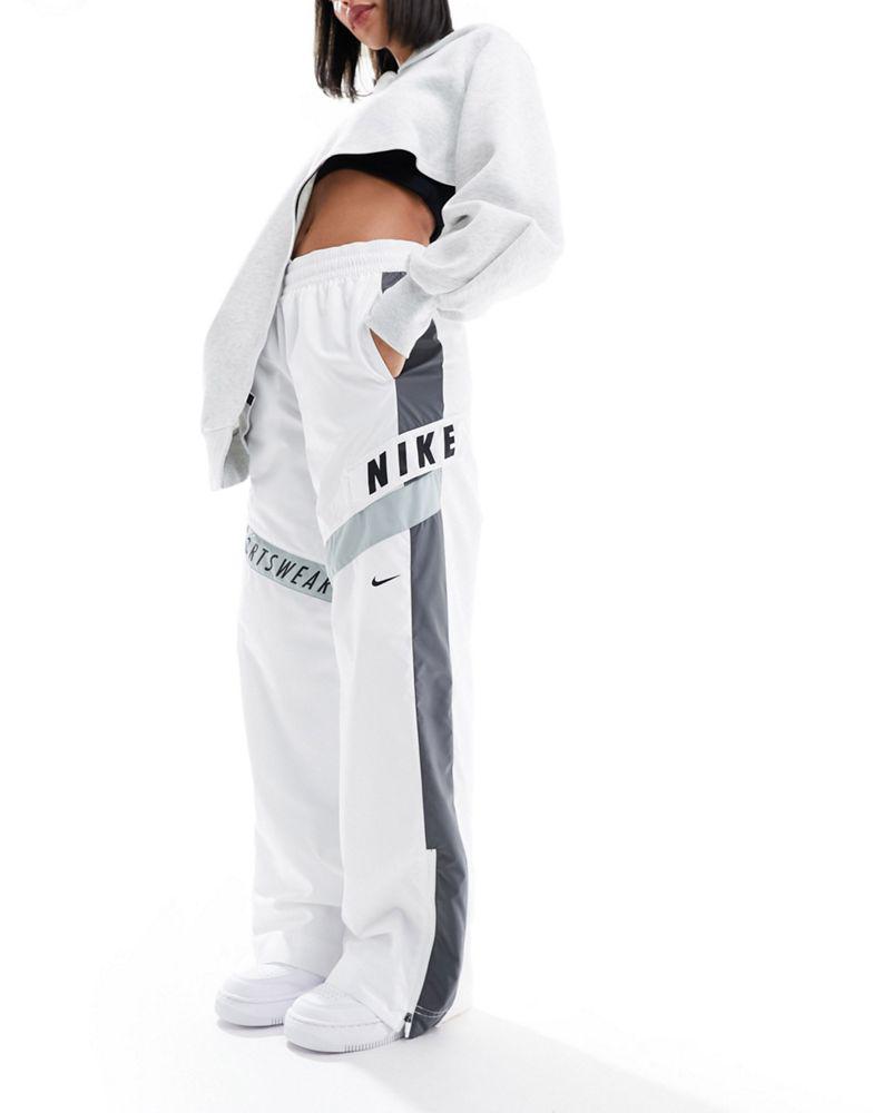 Nike Nike Streetwear woven trackpant in white and grey