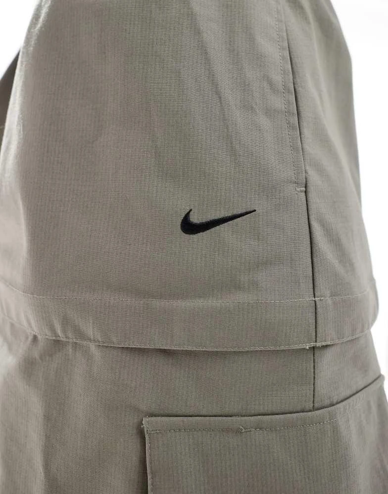 NIKE Nike Woven 2 n 1 maxi and mini skirt with zip detail in grey 5