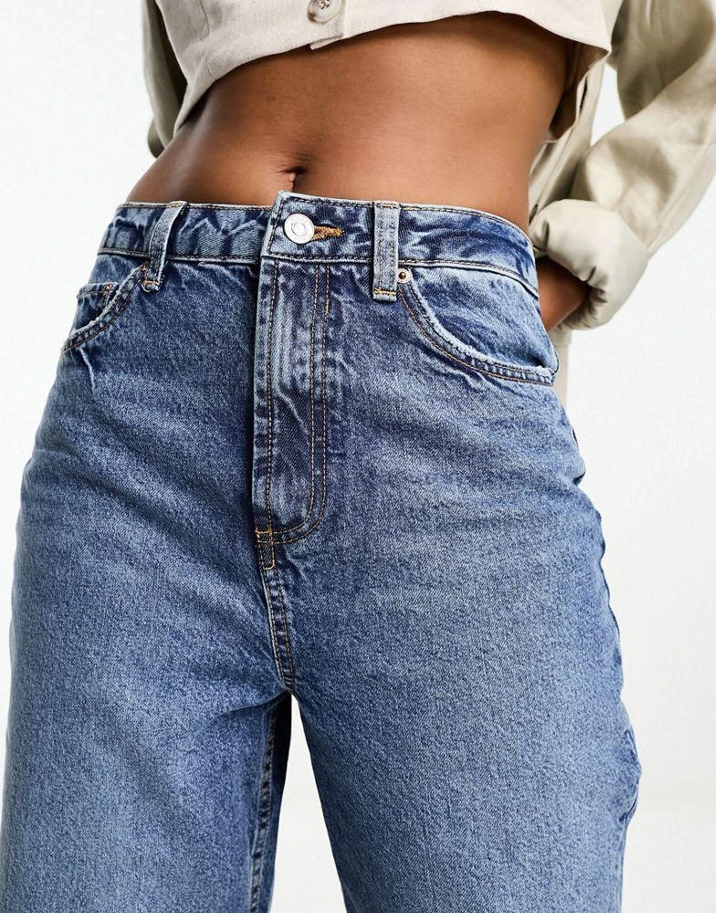 ASOS ASOS DESIGN high rise relaxed mom jeans in mid blue 4