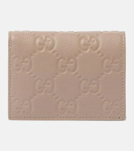 Gucci GG Mini debossed leather wallet 1