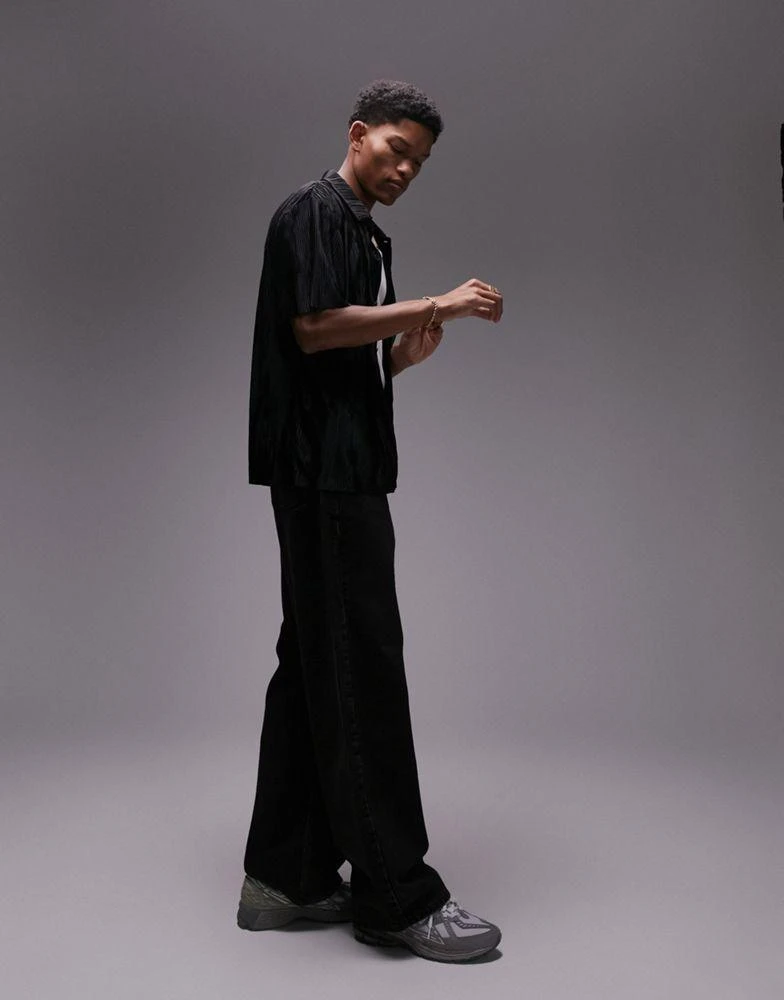 Topman Topman oversized fit button through polo with jacquard plisse in black 4