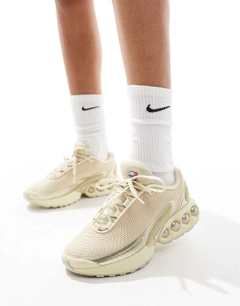 NIKE Nike Air Max DN trainers in beige and gold 1