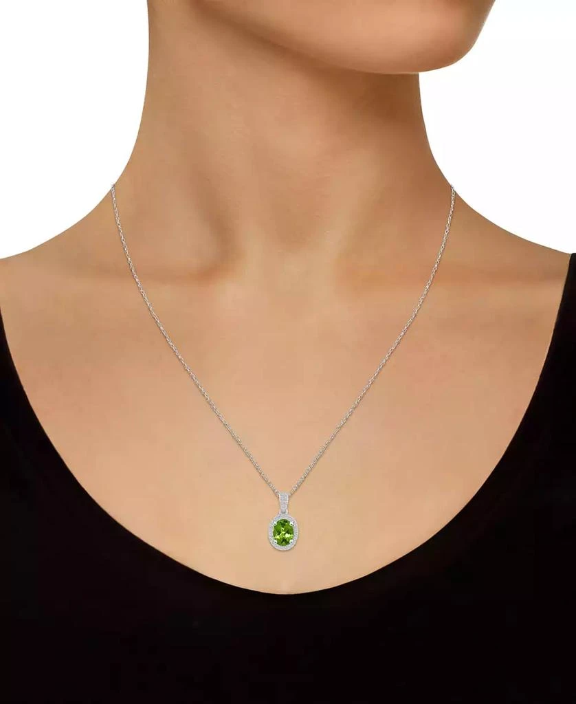 Macy
s Lab-Created Emerald (1 ct. t.w.) 
Lab Created White Sapphire (1/6 ct. t.w.) Oval Pendant Necklace in 10k White Gold 2
