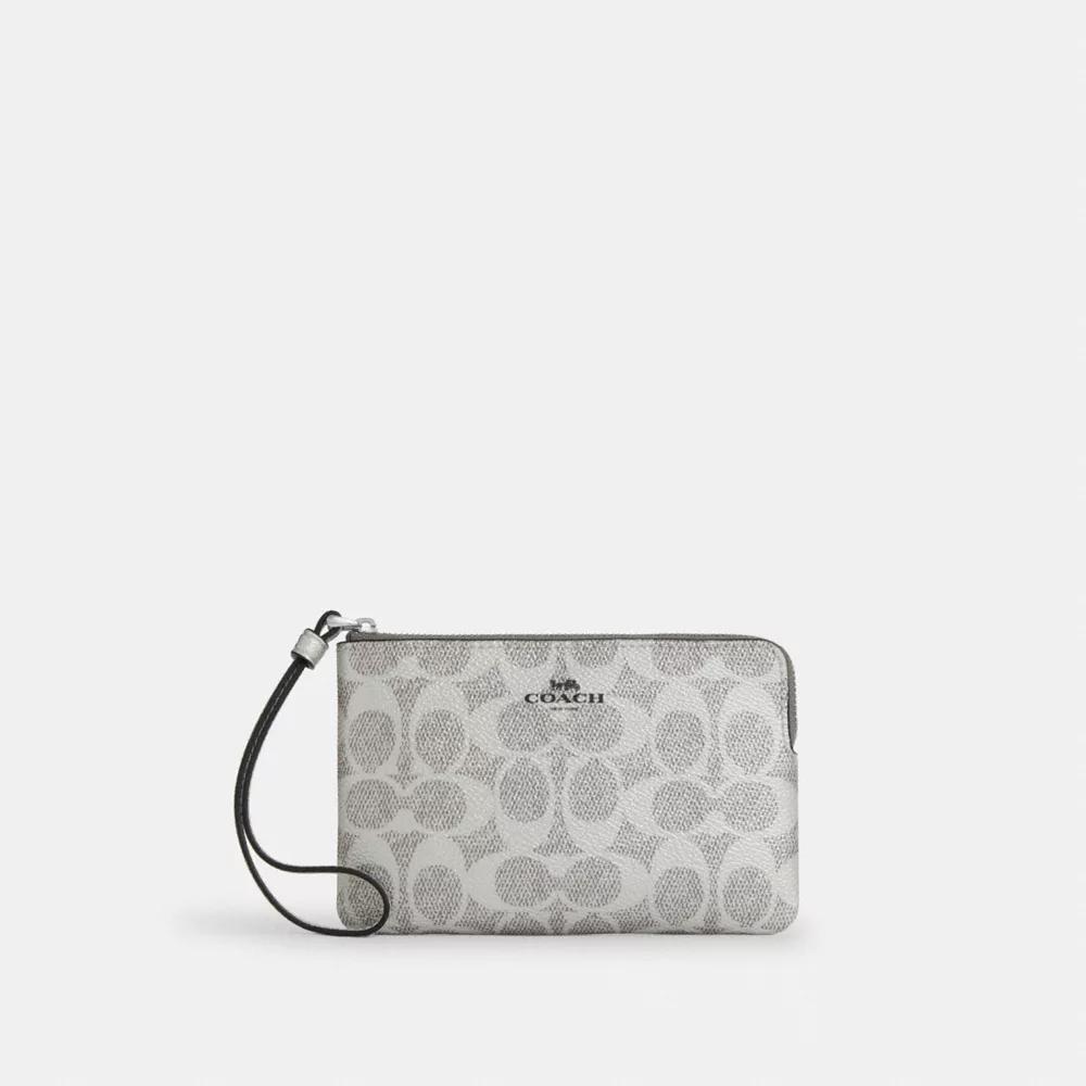 Coach Corner Zip Wristlet In Signature Canvas
