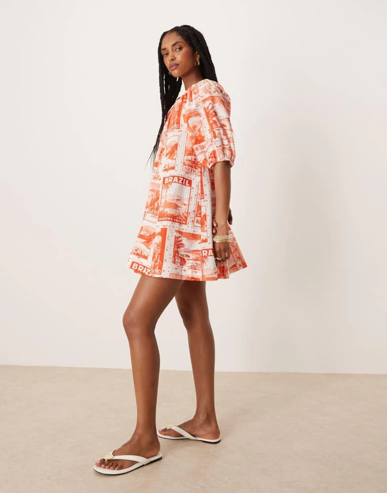 ASOS ASOS DESIGN puff sleeve cotton poplin mini dress in red postcard print 1