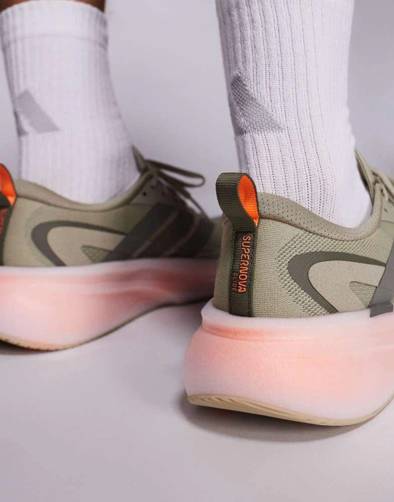 Adidas adidas Running Supernova Glide trainers in olive green and orange 4