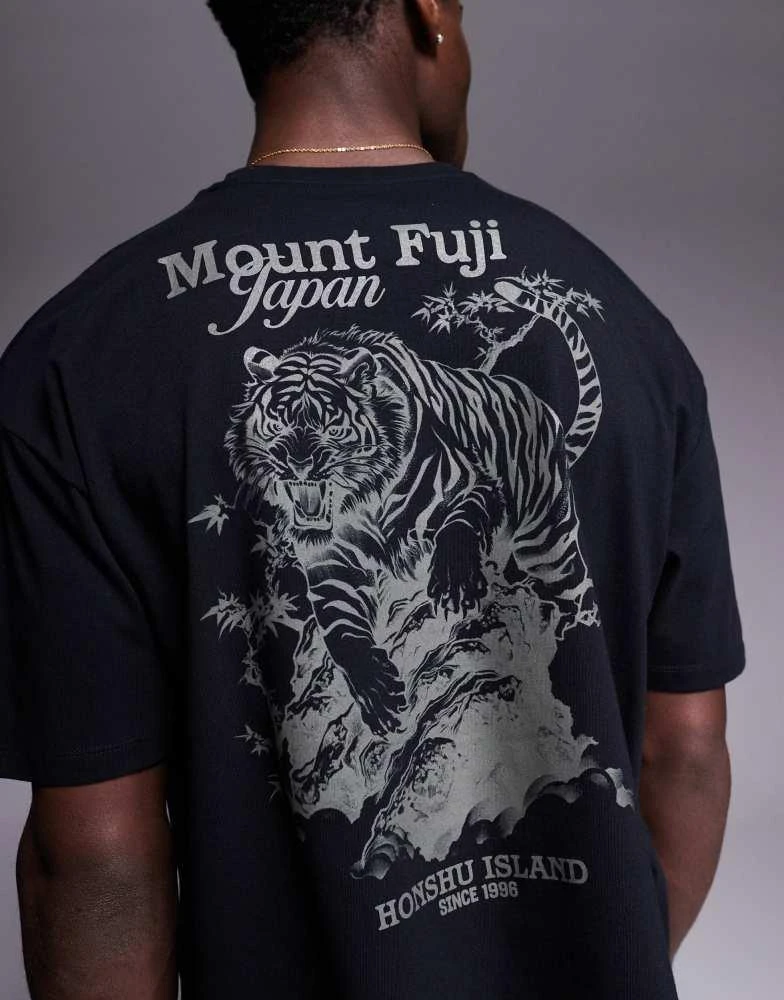 ASOS ASOS DESIGN boxy oversized t-shirt with dragon graphic in black 3