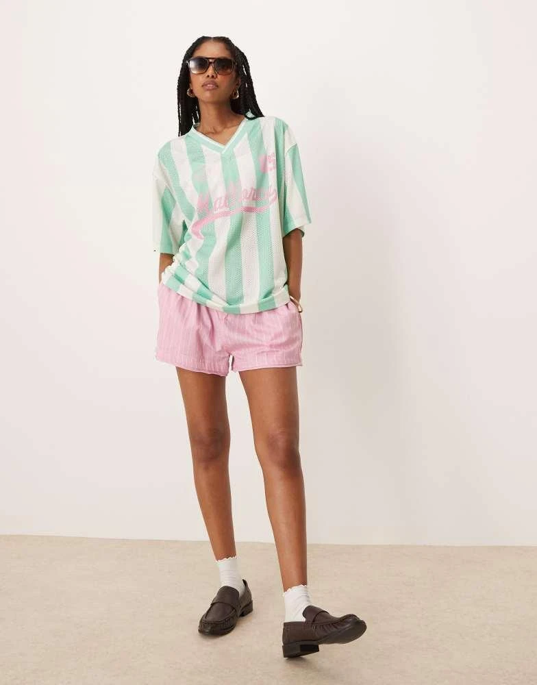 ASOS ASOS DESIGN oversized v neck football t-shirt with mallorca graphic in green stripe 4