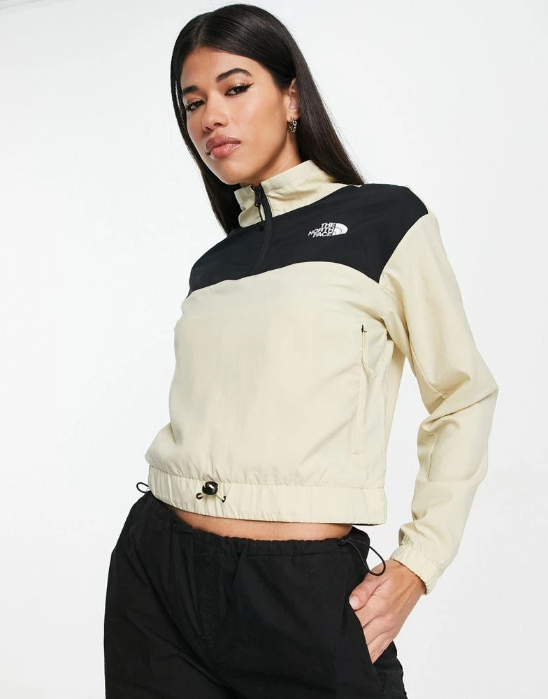 The North Face The North Face Zumu overhead track jacket in stone 1