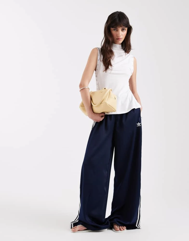 Adidas adidas Originals satin wide leg track pants in navy and off white
