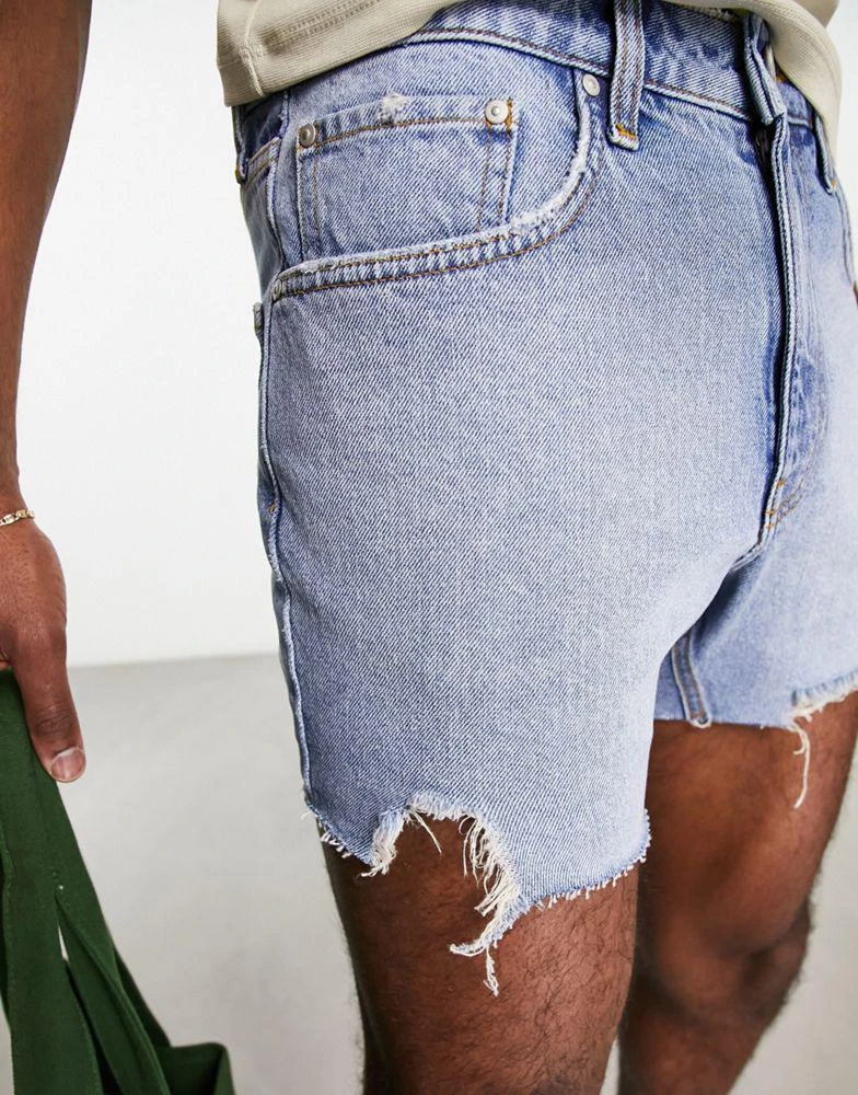 ASOS ASOS DESIGN slim shorter length ripped denim shorts in light blue wash 2