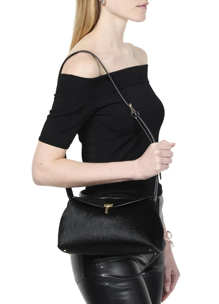 Totême T-Lock pony hair clutch 8
