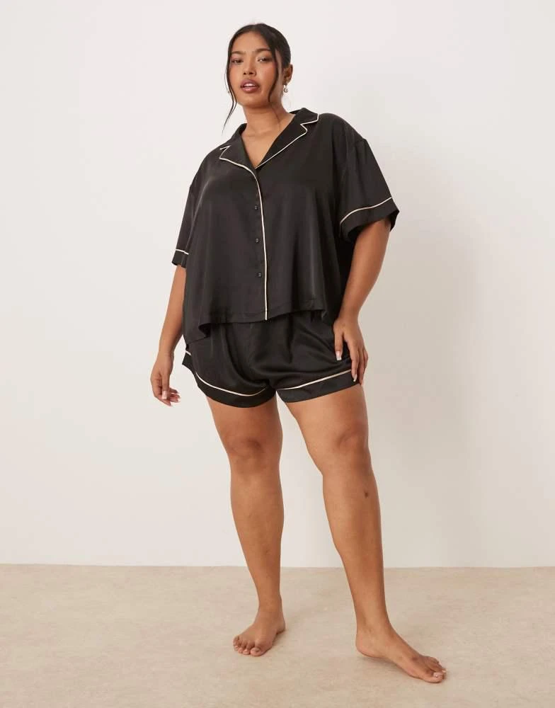 ASOS ASOS DESIGN Curve oversized satin short sleeve shirt and short pyjama set in black 2