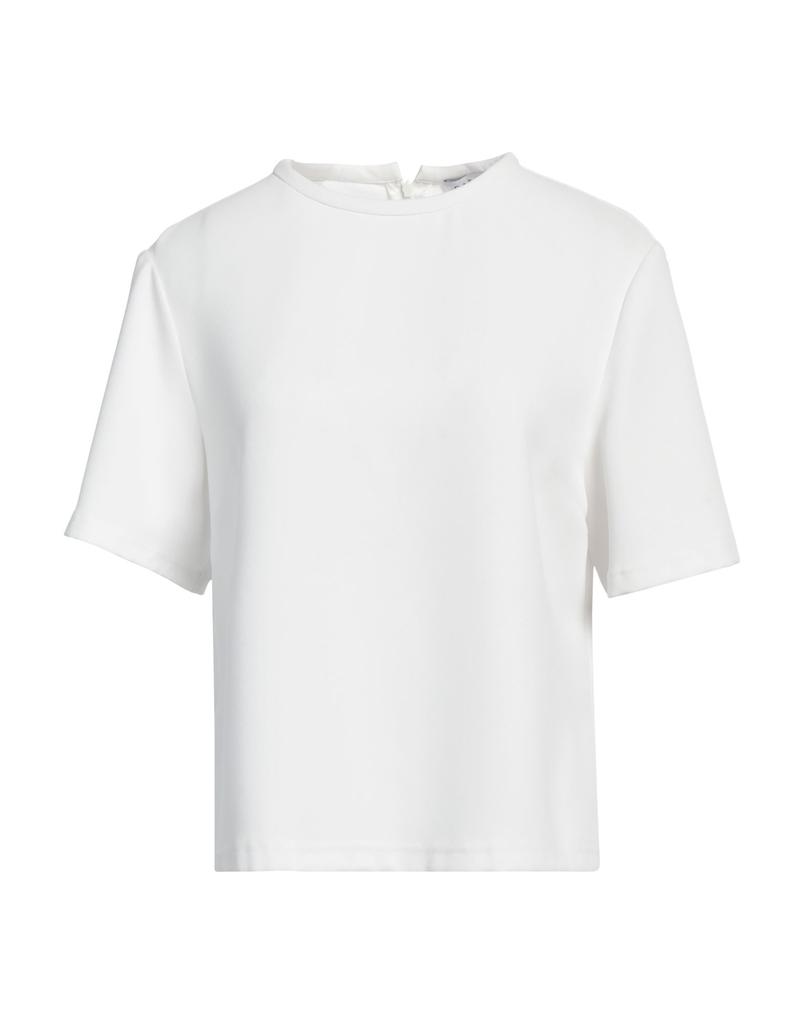 CARACTÈRE Top