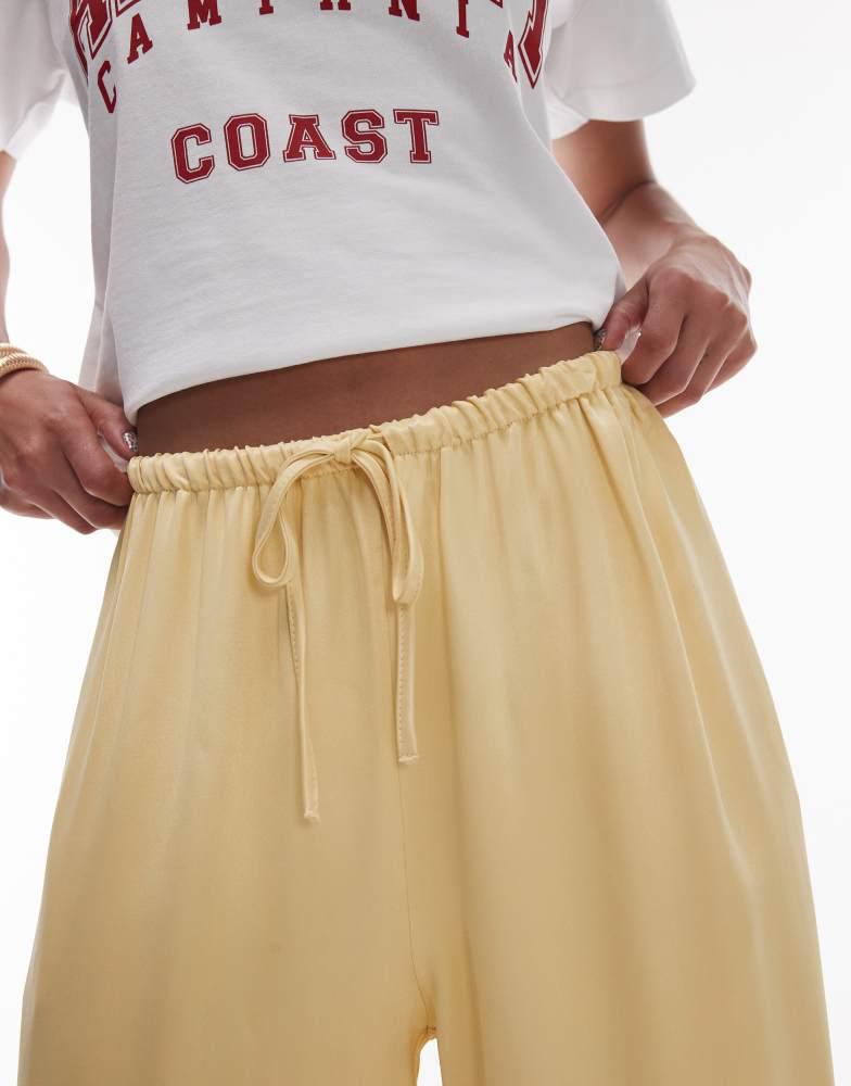 Topshop Topshop satin tie waist wide leg trouser in yellow
