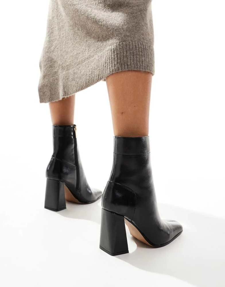 ASOS ASOS DESIGN Everest flared heel boots in black 2