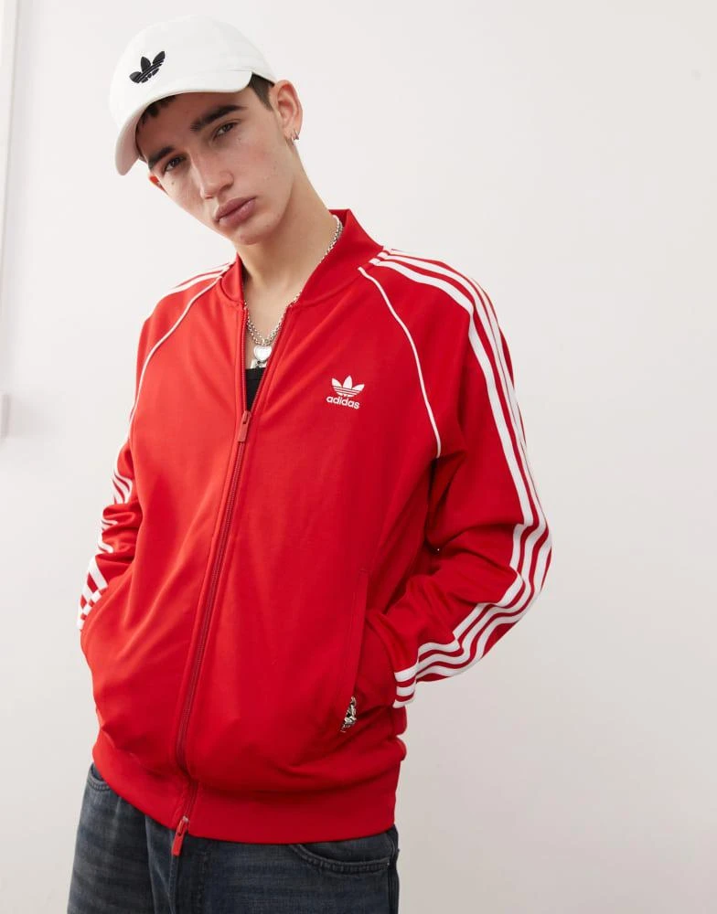 Adidas adidas Originals SST track jacket in red 2