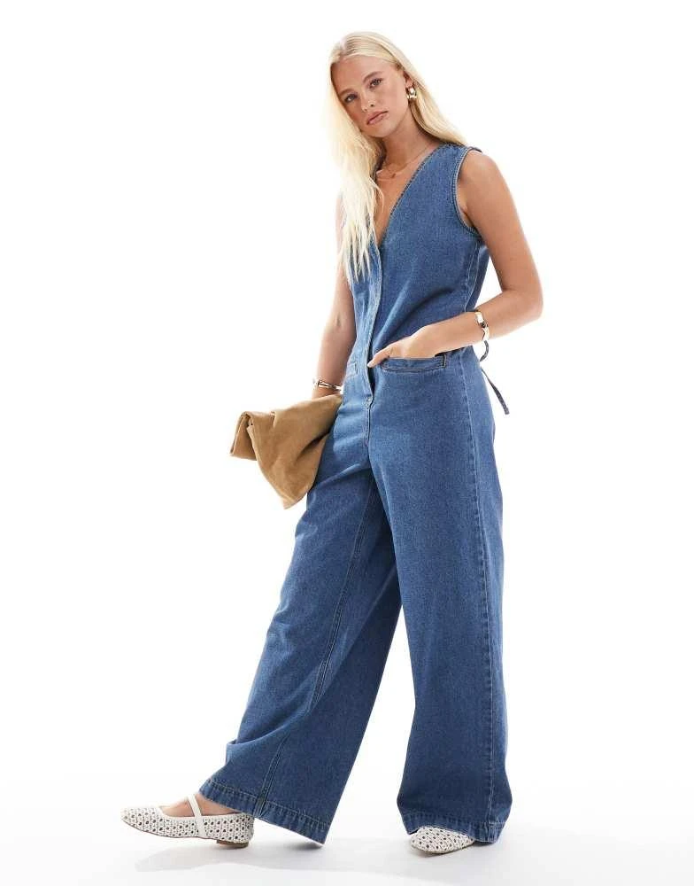 ASOS ASOS DESIGN denim sleeveless loose jumpsuit in midwash blue