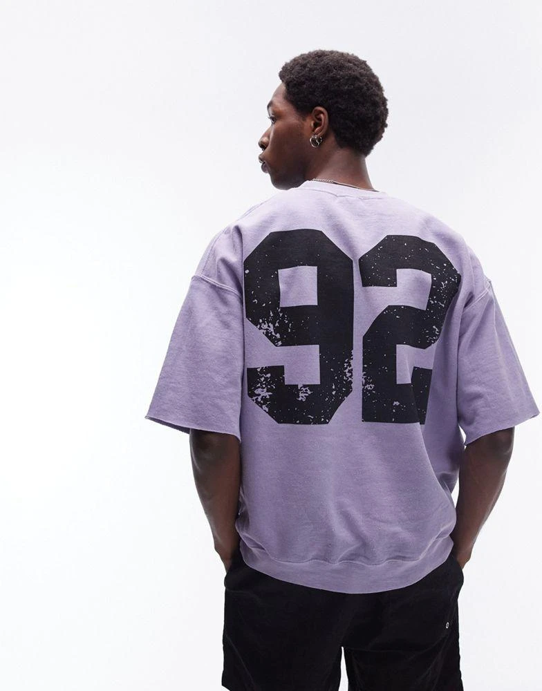 Topman Topman oversized fit short sleeve sweatshirt with number print in washed lilac 1