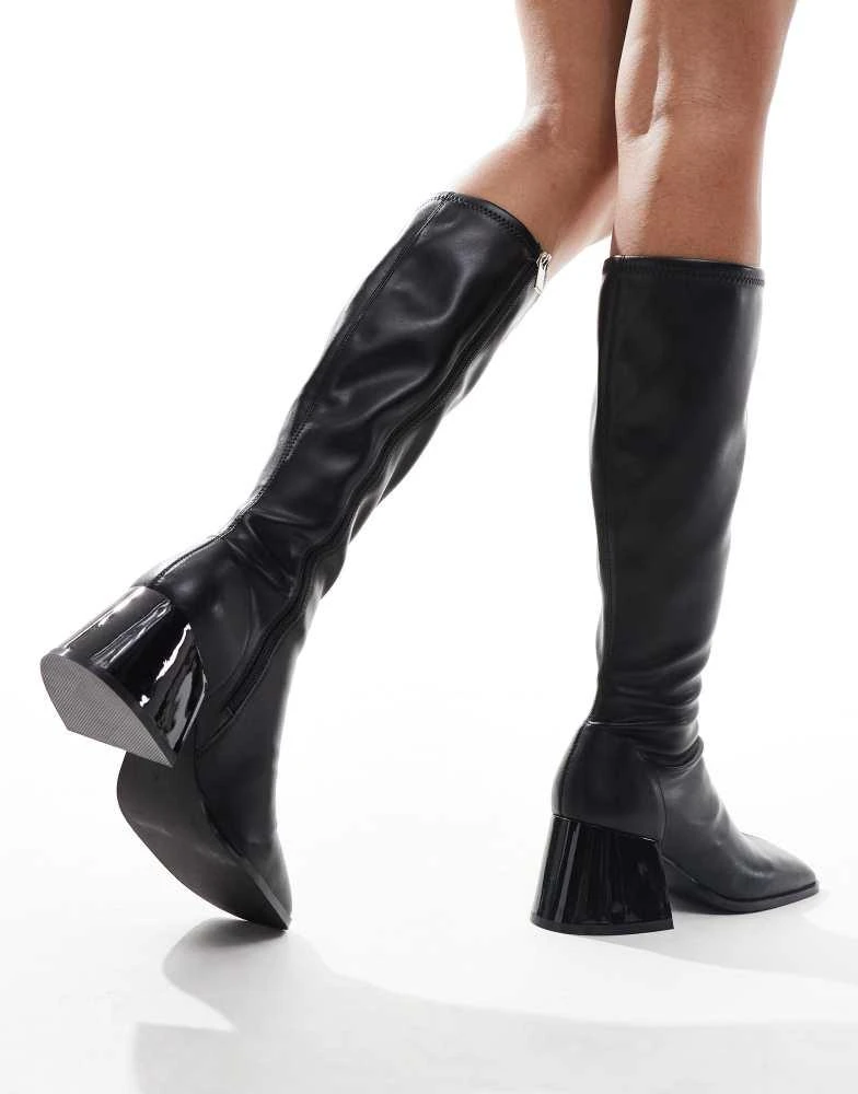 ASOS ASOS DESIGN Cloud flared block heel sock knee boots in black 3