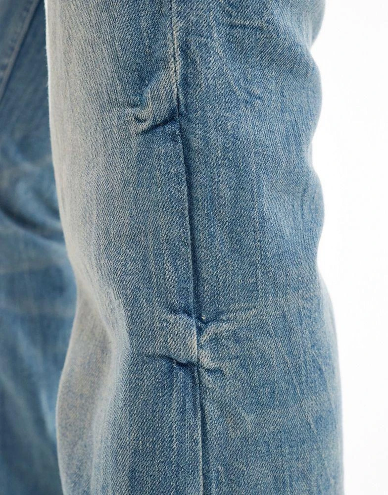 Bershka Bershka low rise bootcut jeans in light blue dirty wash 4
