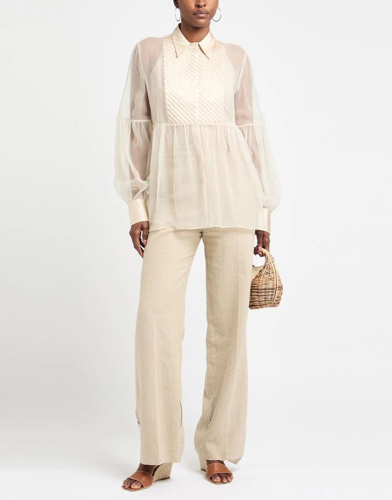 Brunello Cucinelli Silk shirts
blouses 2