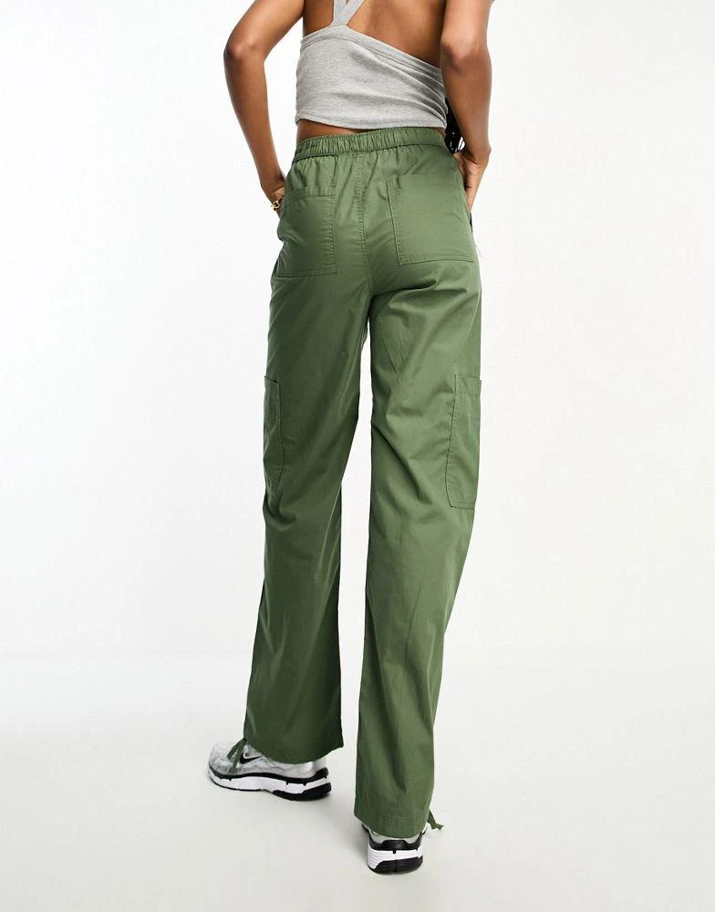 ASOS ASOS DESIGN Tall clean pull on cargo trouser in khaki 2