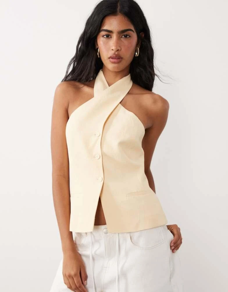 Mango Mango linen mix twist neck halter waistcoat in pastel yellow