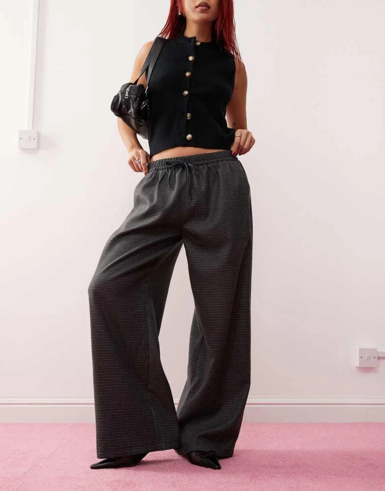 Motel Motel sasari oversized check trousers in navy 3