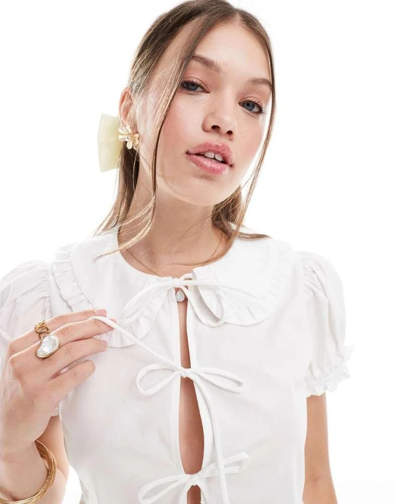 Bershka Bershka poplin peplum tie detail top in white 1