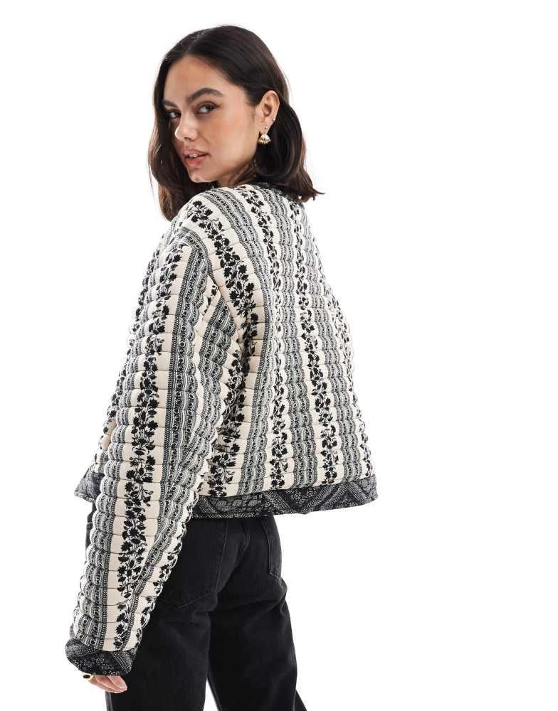 ASOS ASOS DESIGN cropped quilted jacket in patchwork in black and white floral 3