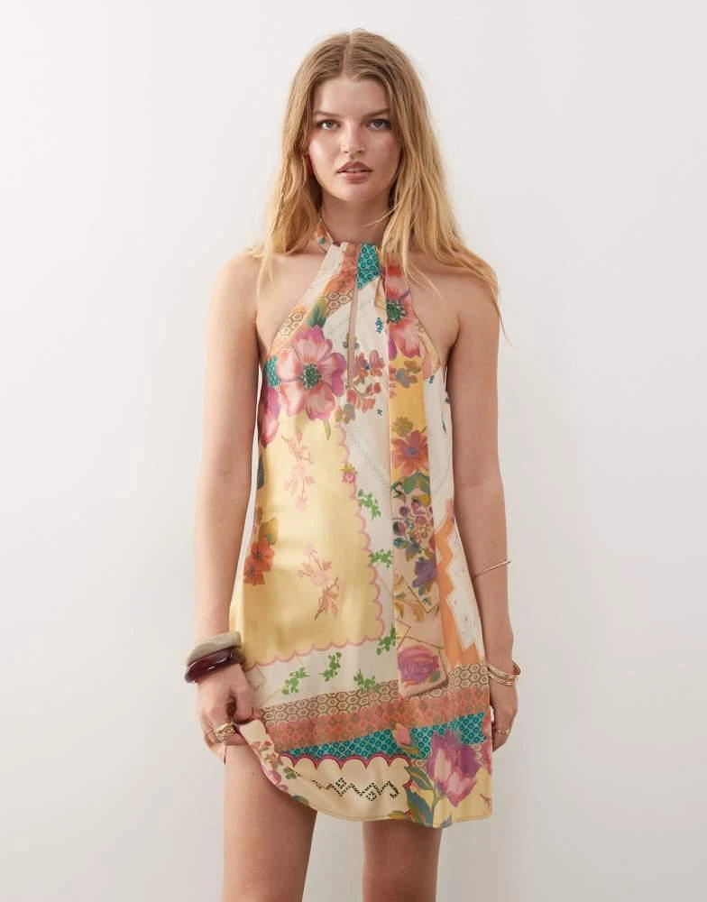 Reclaimed Vintage Reclaimed Vintage mini dress with scarf detail in yellow floral print 1