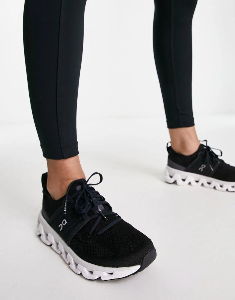 On ON Cloudswift 3 running trainers in black and white 4