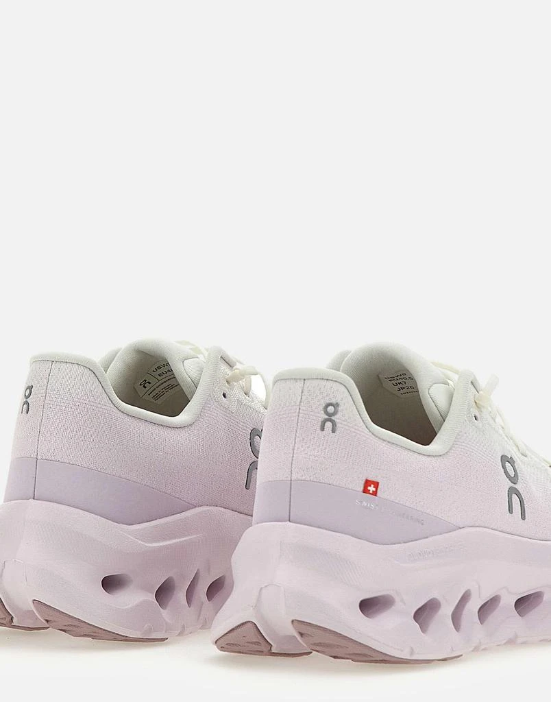 On “Cloudtilt” sneakers 7