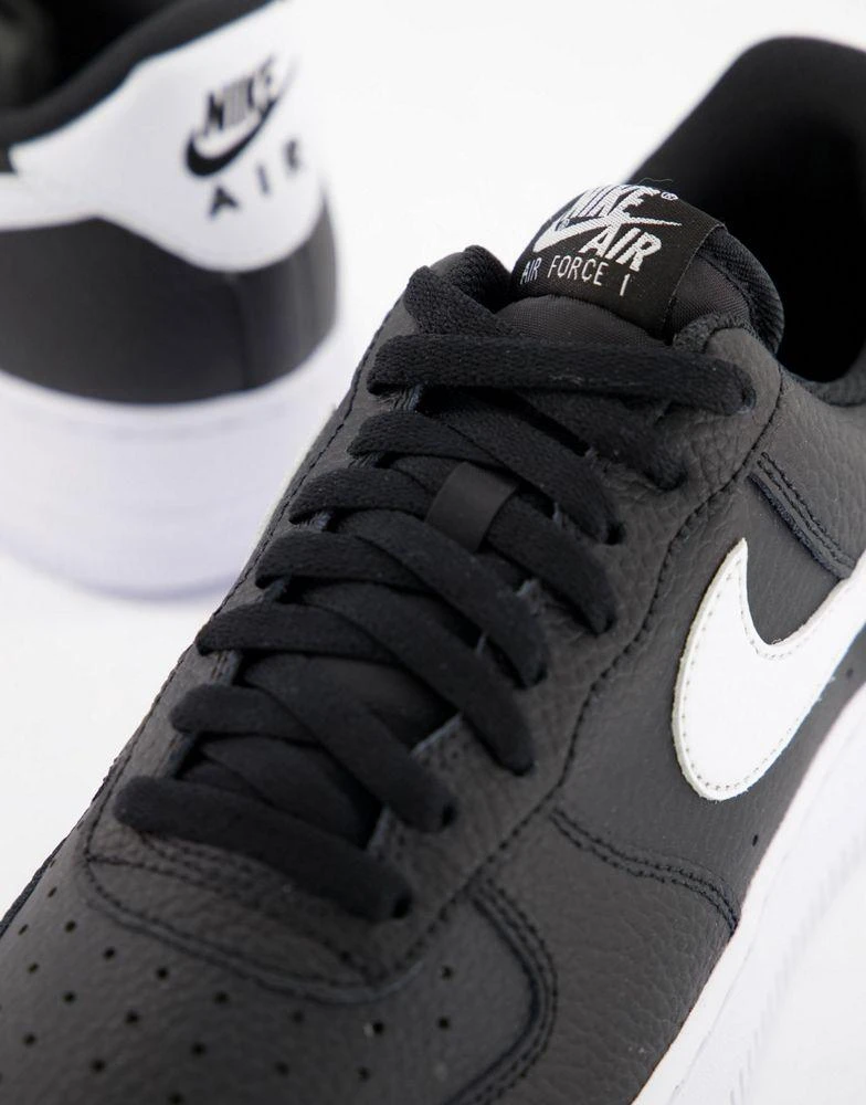 NIKE Nike Air Force 1 '07 trainers in black and white 2