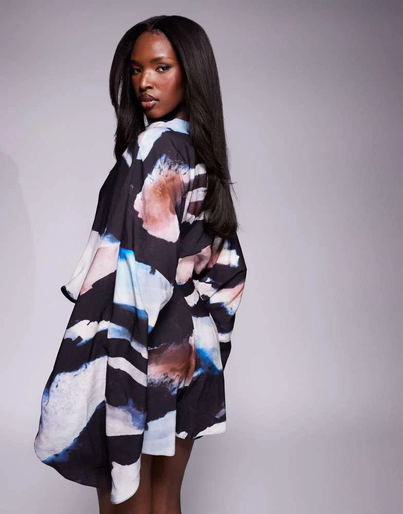 ASOS ASOS DESIGN batwing overlay playsuit in abstract print 2