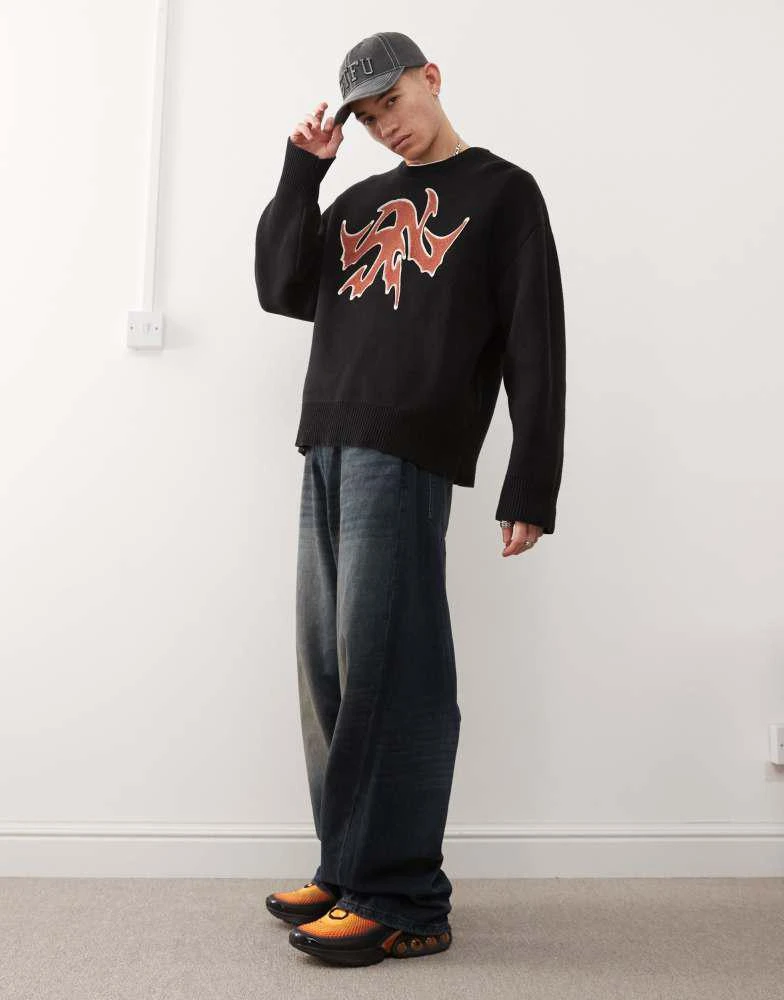 Weekday Weekday Cypher oversized jumper with red jacquard graphic in black 3