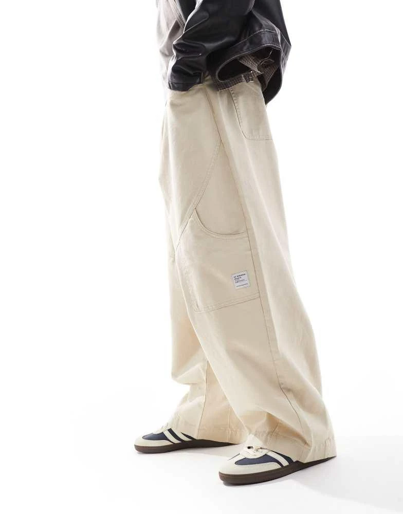ASOS ASOS DESIGN baggy trousers with workwear patch in stone 1