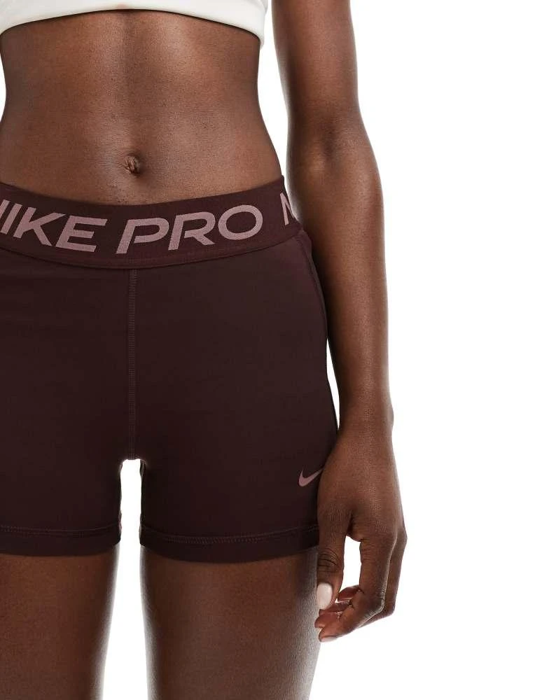 NIKE Nike Pro Training 365 3 inch leakproof leggings shorts in dark brown 4