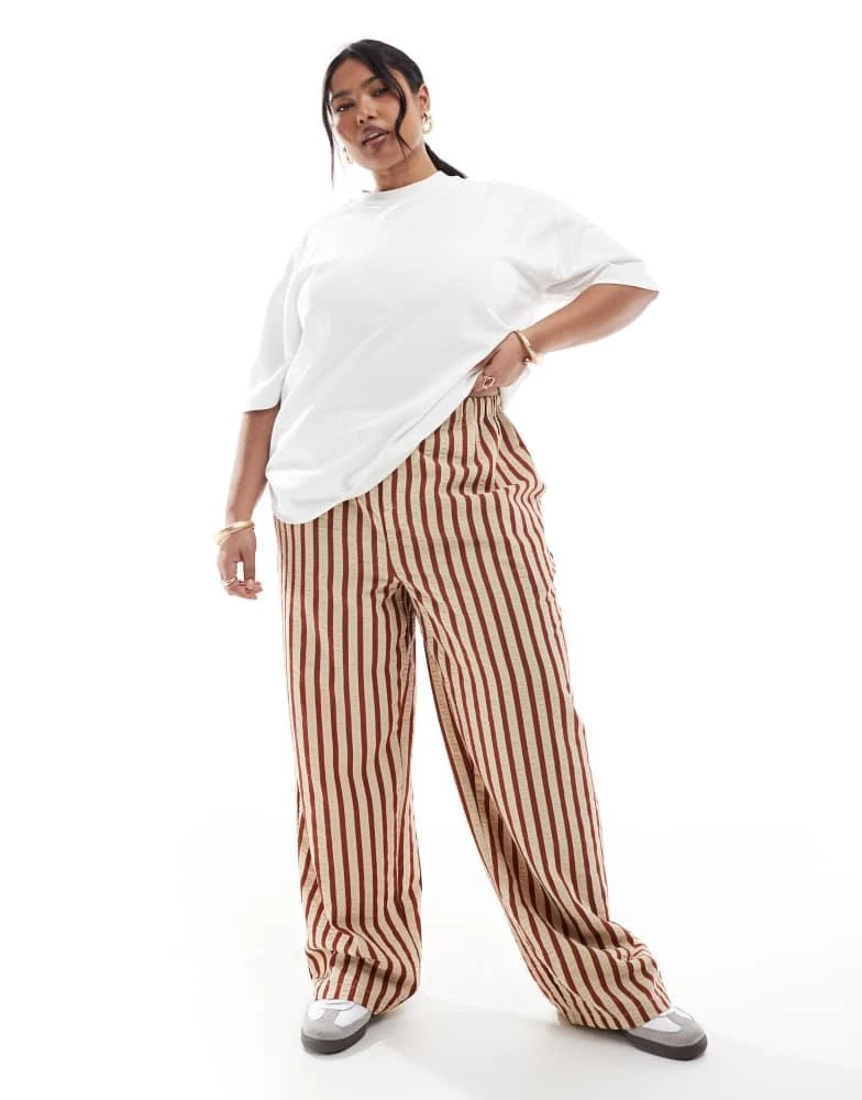 ASOS ASOS DESIGN Curve straight leg seersucker trousers in rust stripe 1