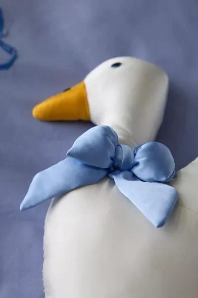 Urban Outfitters Goose Shaped Satin Throw Pillow 2