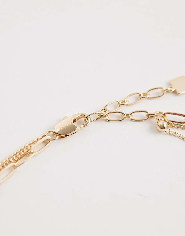 ASOS ASOS DESIGN multi-row necklace with faux pearls and t-bar detail in gold tone 3