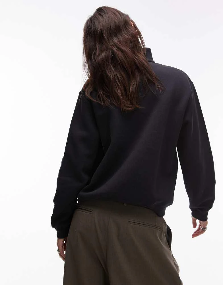 New Balance New Balance graphic half zip hoodie in black 4