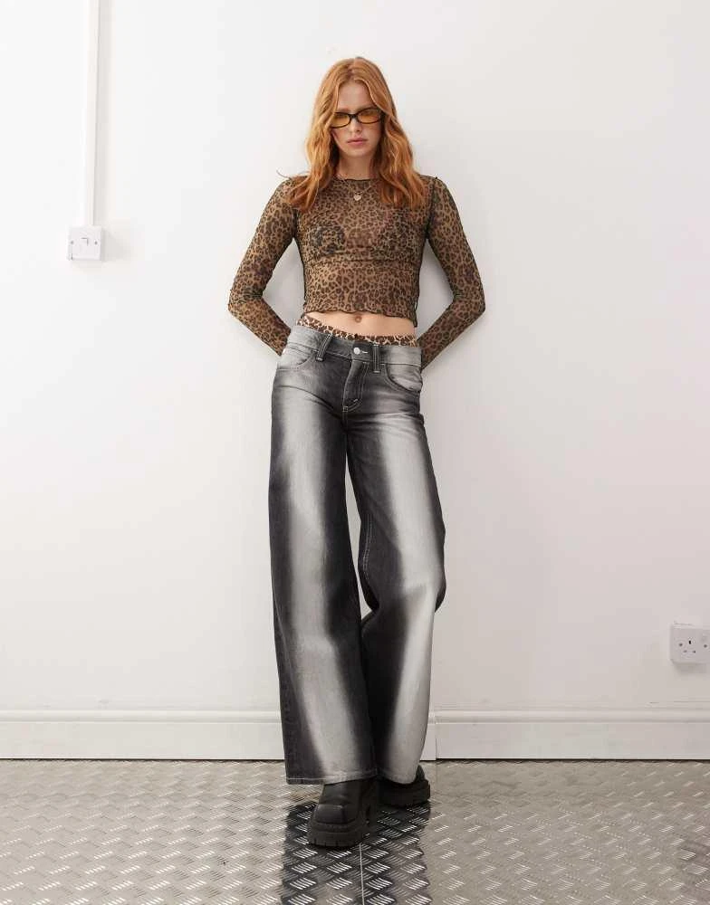 Cheap Monday Cheap Monday Poser mid rise wide leg skater jeans with extreme spray in washed black 1