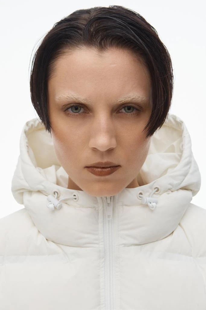 Alexander Wang cropped hooded puffer vest with reflective logo 4