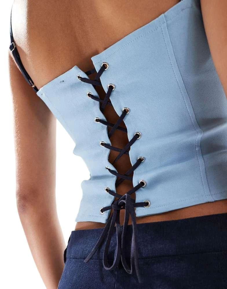 Motel Motel Exclusive alexa bow detail corset cami top in blue and navy 2