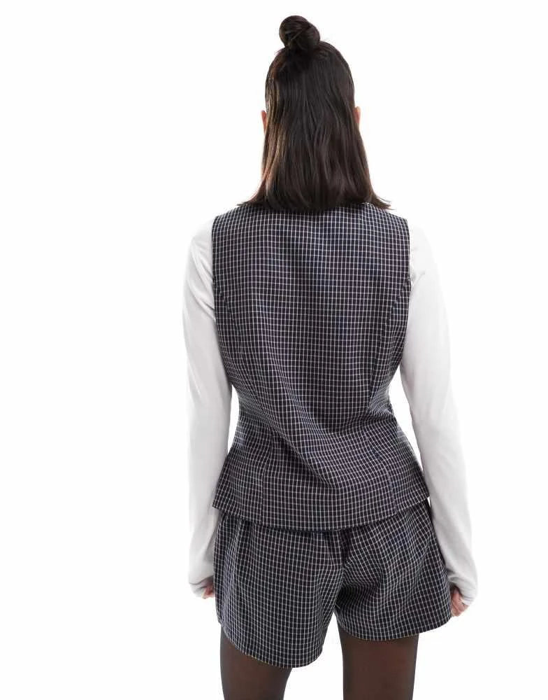 ASOS ASOS DESIGN high neck button through waistcoat in black check 4