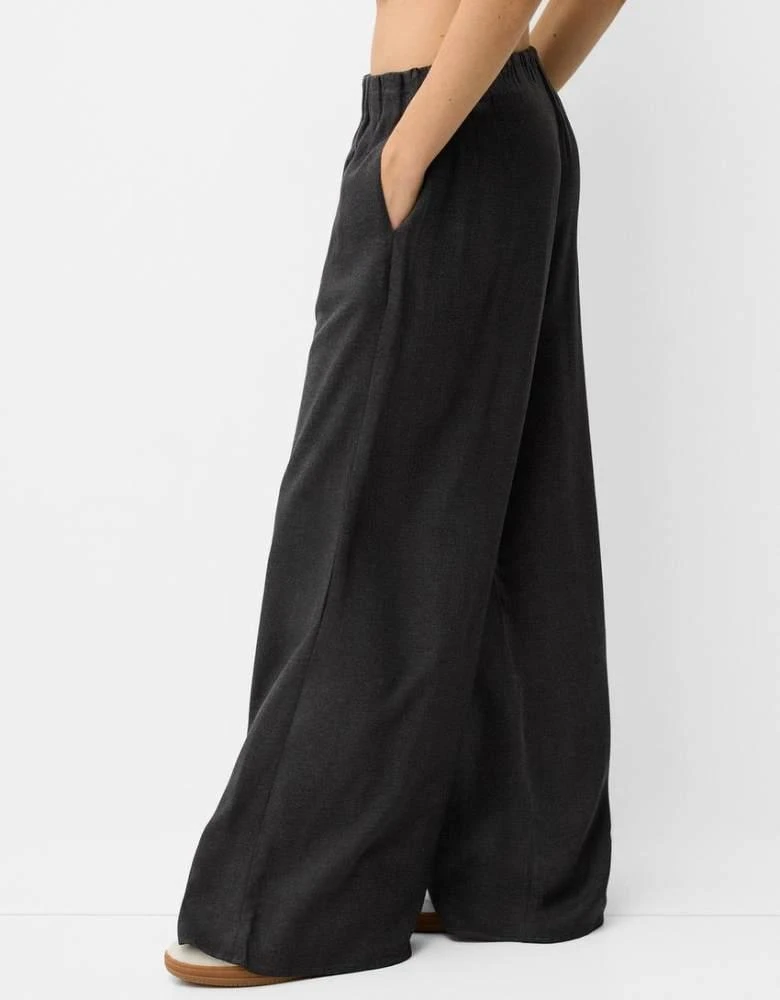 Bershka Bershka Petite drawstring waist wide leg trousers in dark grey check 3