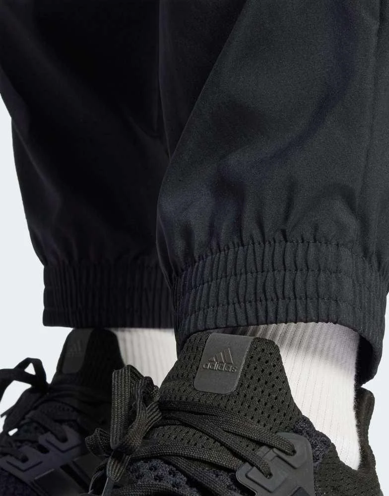 Adidas adidas Essentials small logo cargo pants in black / white 2