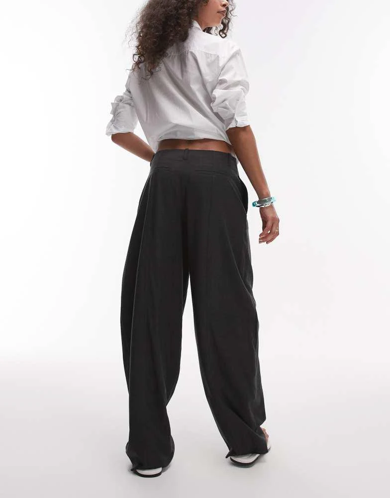 Shop Topshop mid rise balloon leg clean waistband tapered trouser